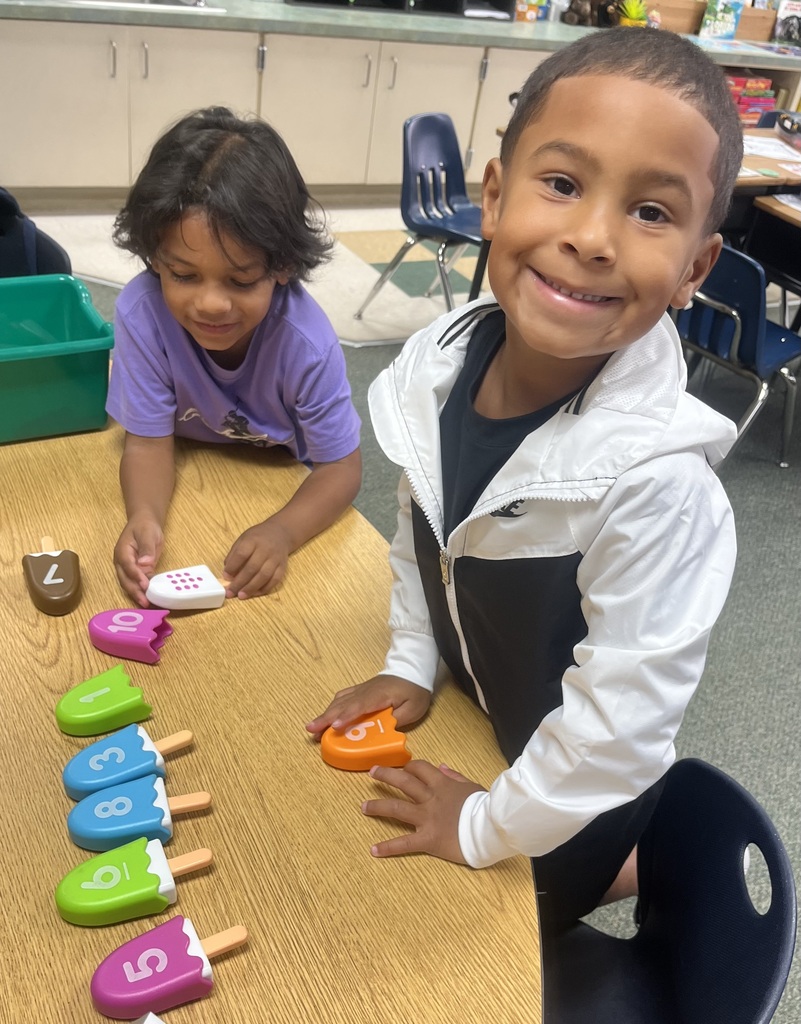 students playing on the floor