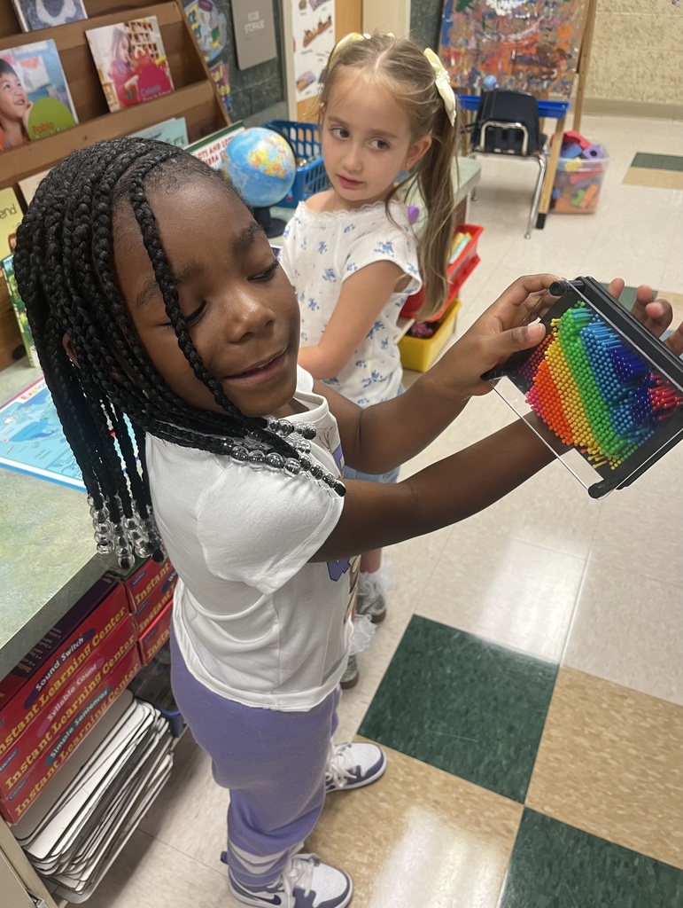 students playing on the floor