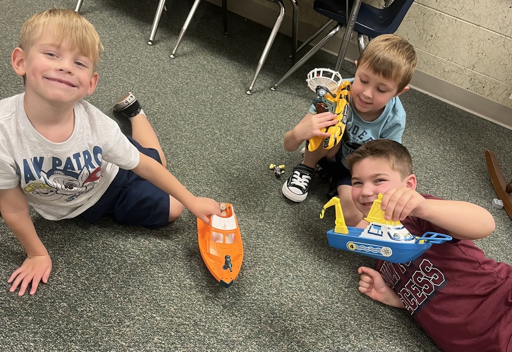 students playing on the floor