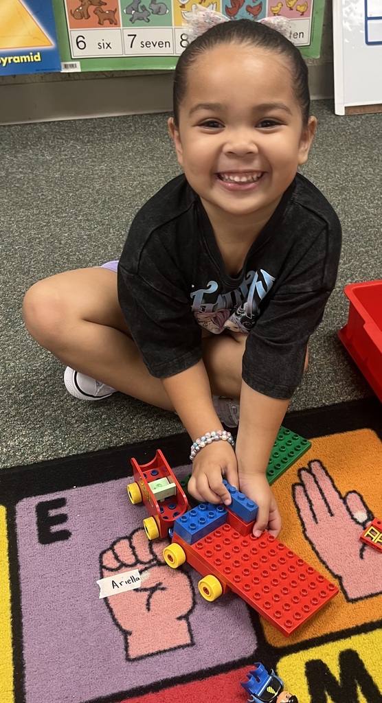 students playing on the floor