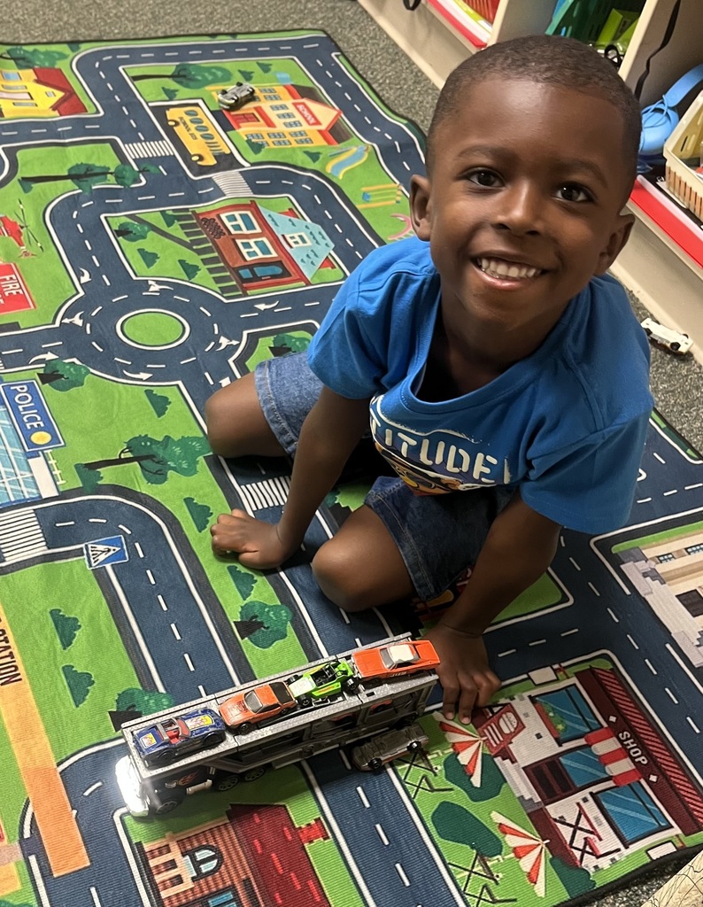 students playing on the floor