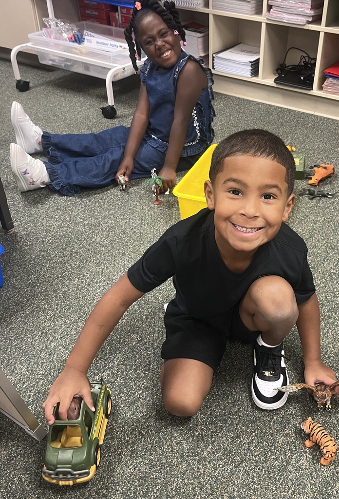 students playing on the floor