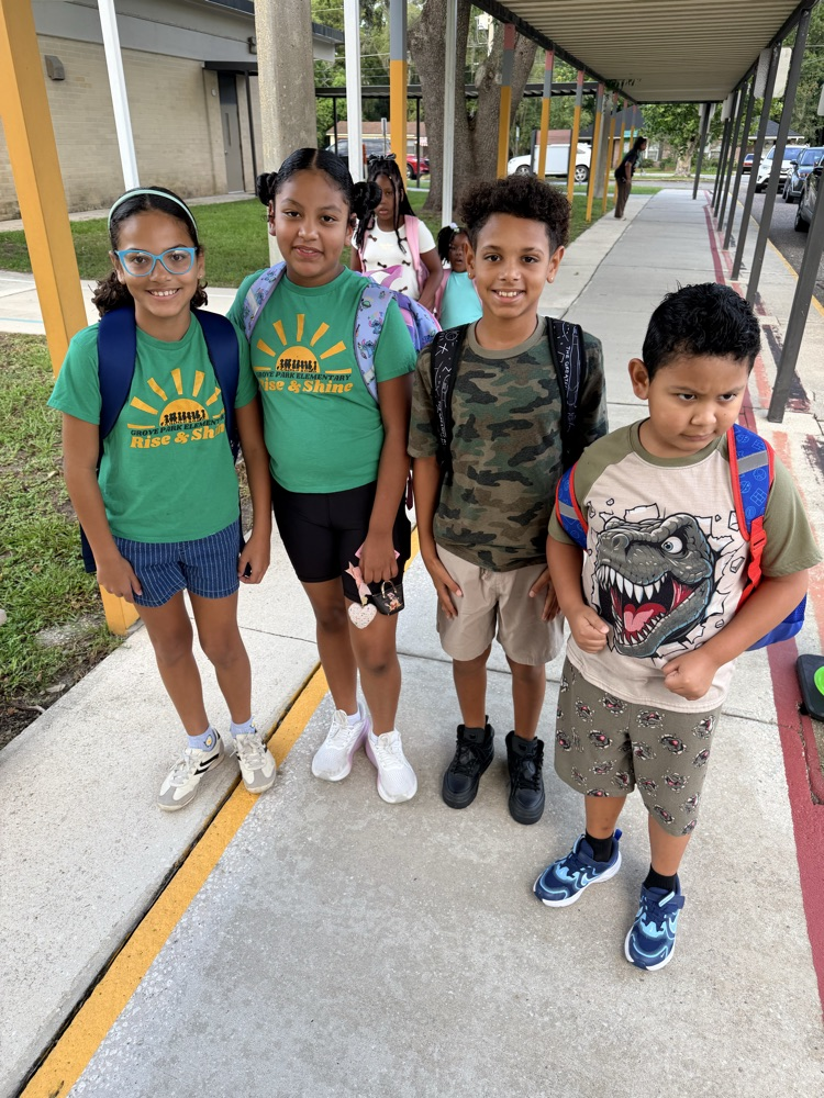 GPE Students and Staff photos wearing Grove Park and green shirts