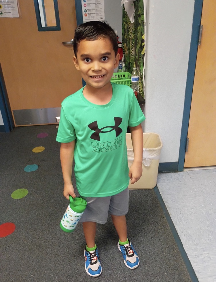 GPE Students and Staff photos wearing Grove Park and green shirts
