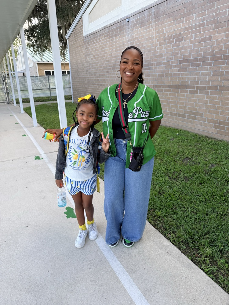 GPE Students and Staff photos wearing Grove Park and green shirts