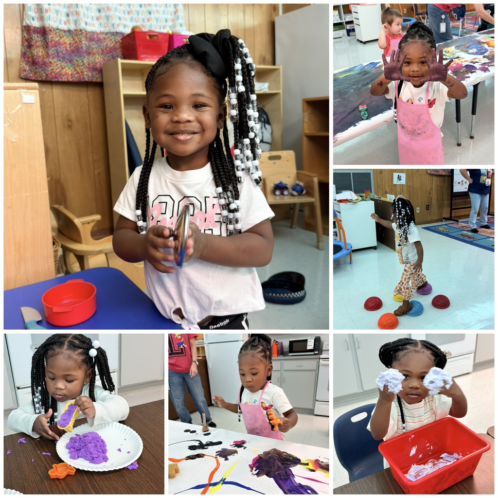 student playing at different learning stations