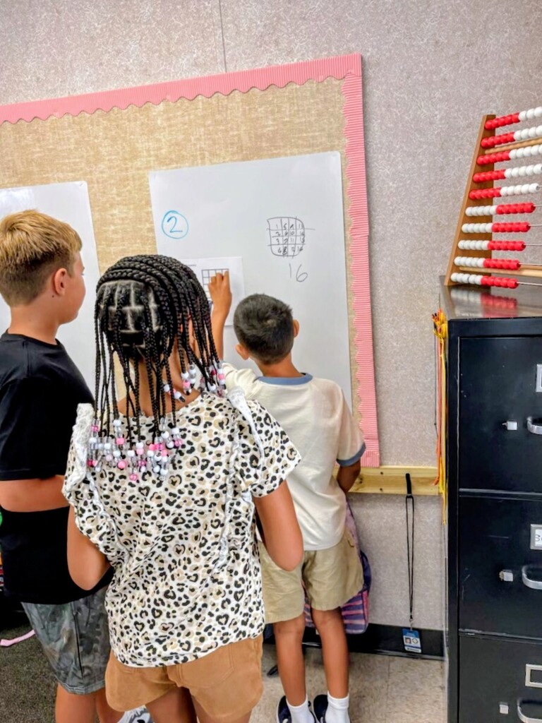 Brains on, chalk/markers out! 🧠✨  Mrs. Edgar’s class took learning off their desks and onto the walls today! 🪜💡 The students tackled some brain-busting "Thinking Tasks" using vertical learning boards, and the collaborative energy in the room was off the charts.  When kids stand up, work together, and map out their ideas in real-time, magic happens—and maybe a few erased mistakes along the way! Huge shoutout to these rockstar thinkers for showing us what active learning is all about. 🚀📊