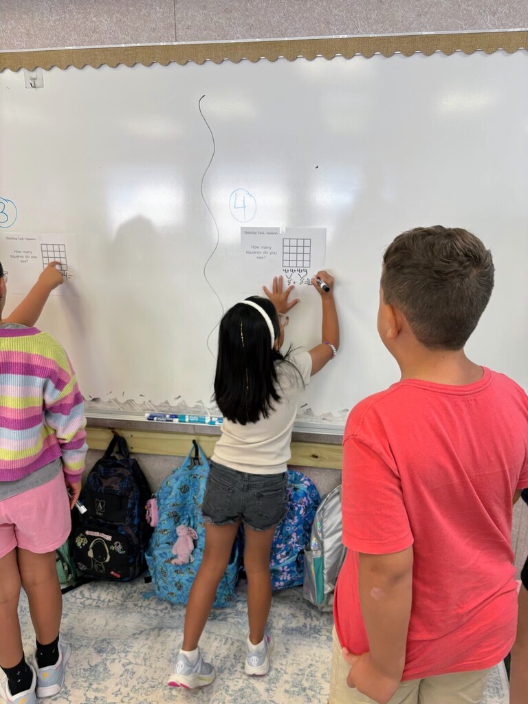 Brains on, chalk/markers out! 🧠✨  Mrs. Edgar’s class took learning off their desks and onto the walls today! 🪜💡 The students tackled some brain-busting "Thinking Tasks" using vertical learning boards, and the collaborative energy in the room was off the charts.  When kids stand up, work together, and map out their ideas in real-time, magic happens—and maybe a few erased mistakes along the way! Huge shoutout to these rockstar thinkers for showing us what active learning is all about. 🚀📊