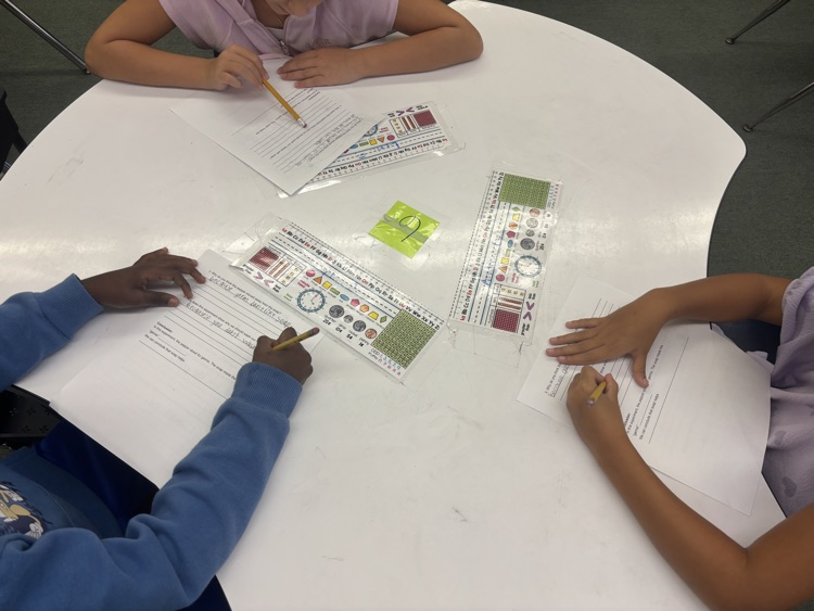 Students working through a Science Investigation