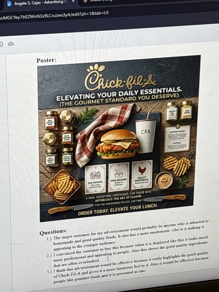 A webpage shows a poster for Chick-fil-A featuring a chicken sandwich, fries, and sauces with a red and white checkered cloth.