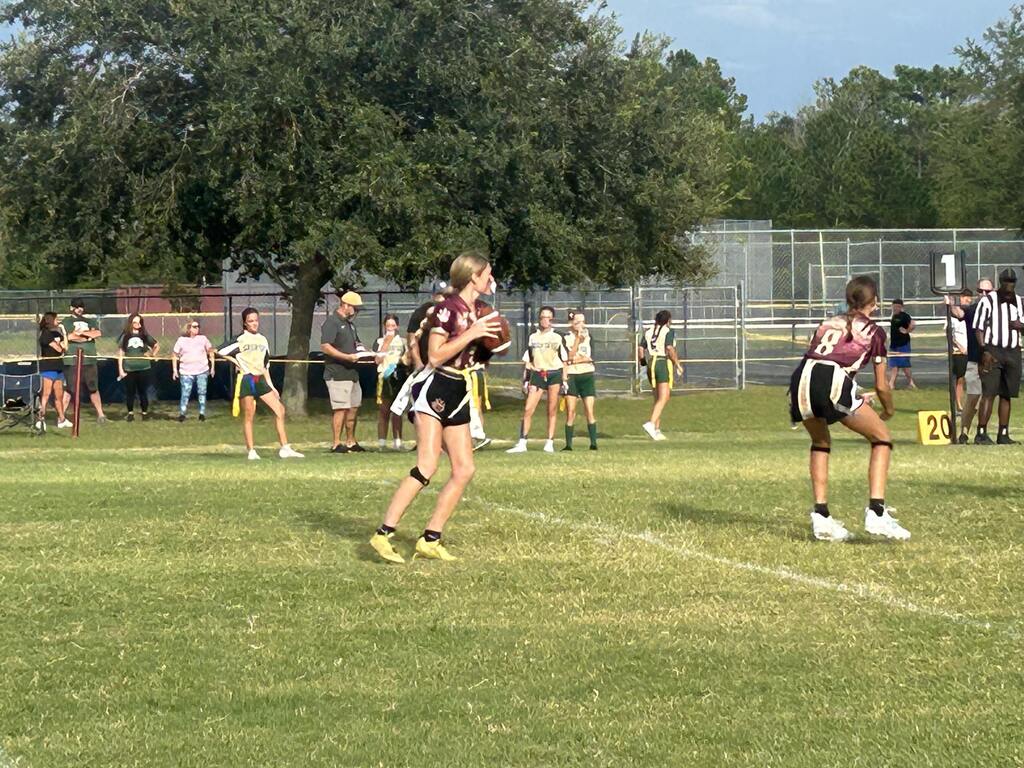 LAJH Flag Football Student Running with Football