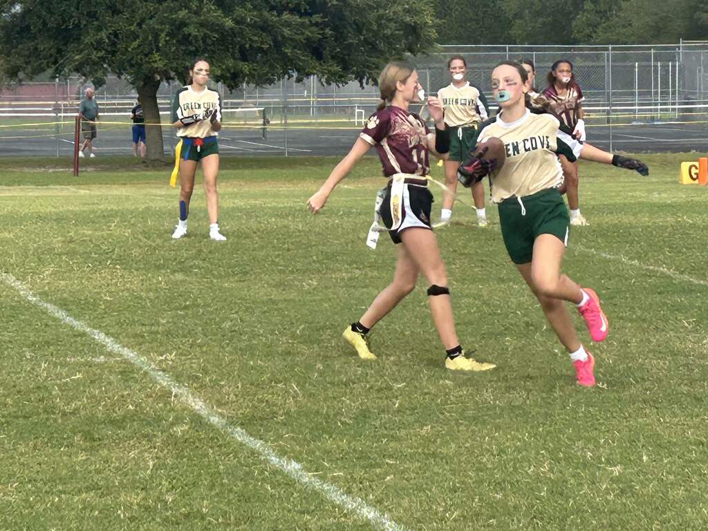GCJ Flag Football Student Running with Football