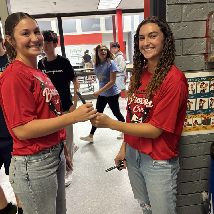 girls giving out popsicles