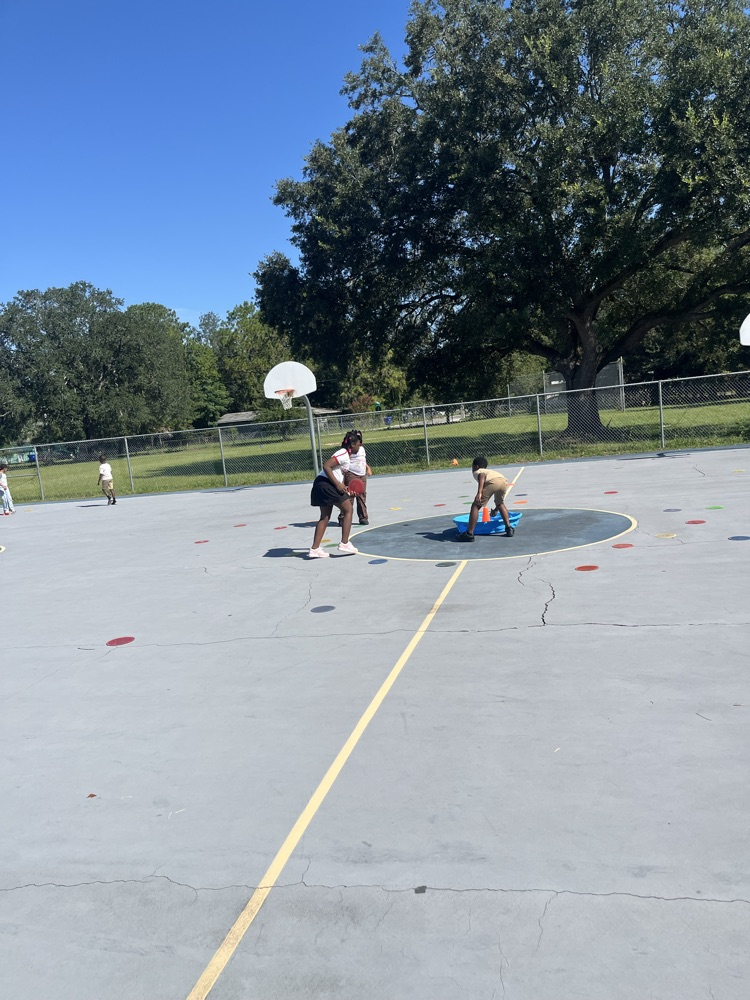 Students playing Make it, Take it outside 