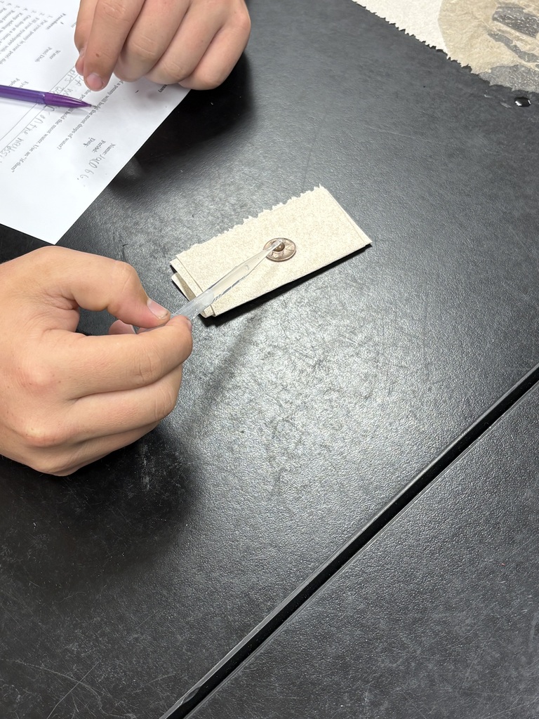 hands using a dropper
