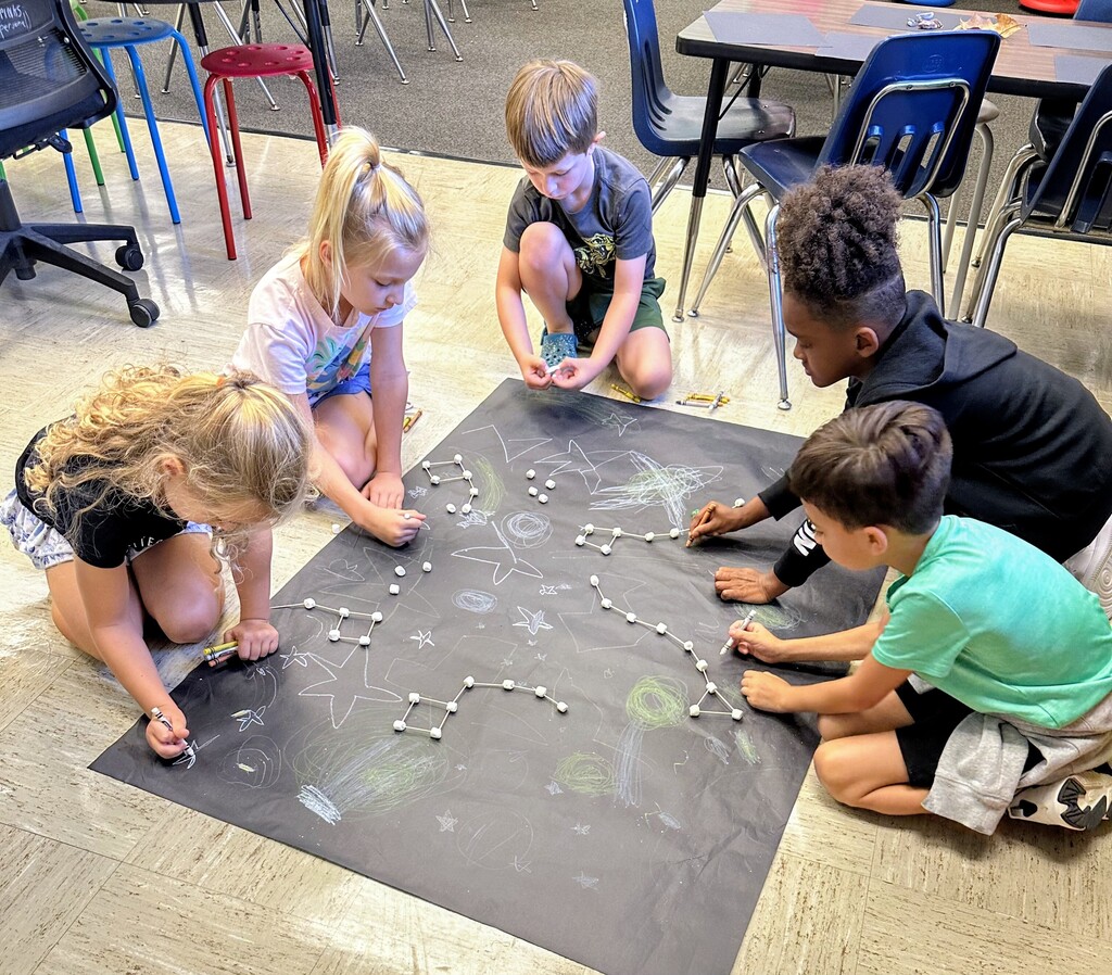 The future is looking extra bright in 1st grade! ✨🌟  Young scientists in Mrs. Spinks and Ms. Stankiewicz’s classes teamed up to show off everything they’ve learned about the night sky! 🌙🔭 From constellations to cosmic facts, we definitely have a whole lot of STARS shining bright at PES! 💫🚀  #PESFirstGrade #YoungScientists #NightSky #STEMinAction #ShineBright