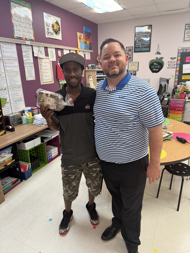 Principal Martin posing with Jean Compere, School-Related Employee of the Year Nominee