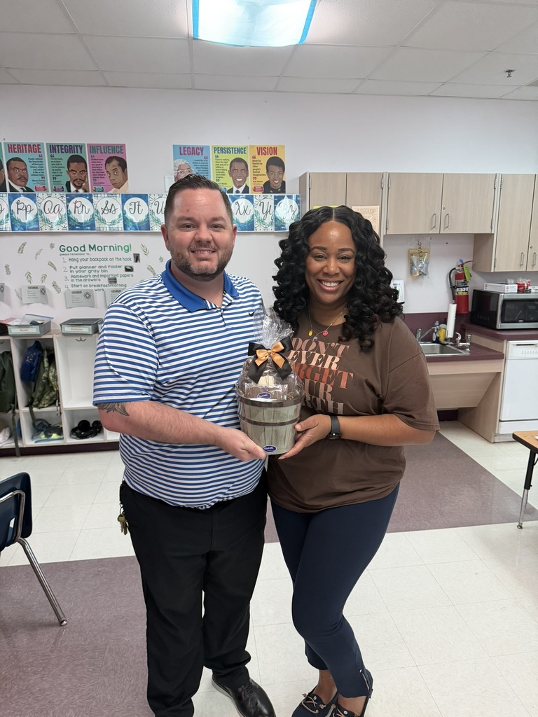 Principal Martin with Jennice Frazier, School-Related Employee of the Year
