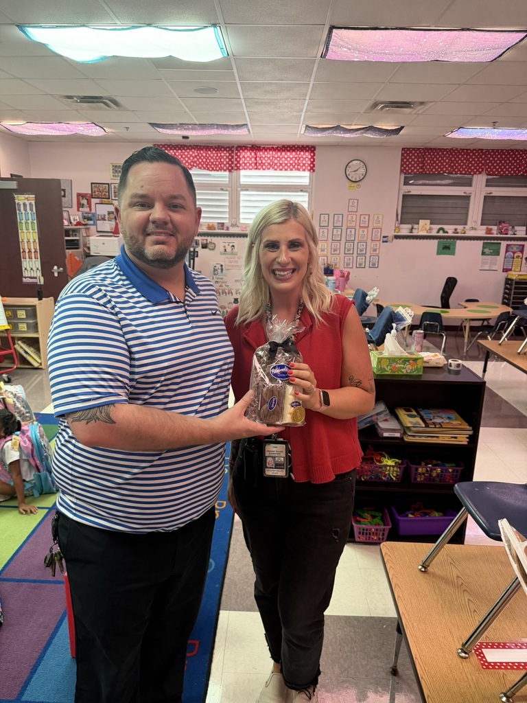 Principal Martin posing with Kelleen Miller, School-Related Employee of the Year Nominee