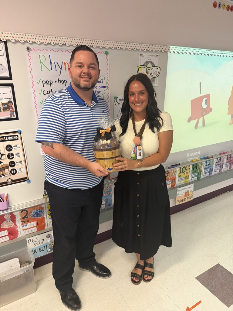 Principal Martin posing with Amber-Lynn Mullins, Teacher of the Year