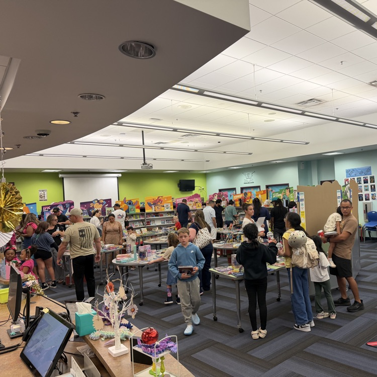 parents and students shopping at the book fair