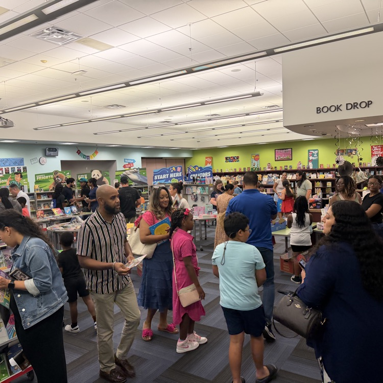 parents and students shopping at the book fair