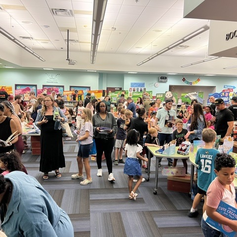 parents and students shopping at the book fair