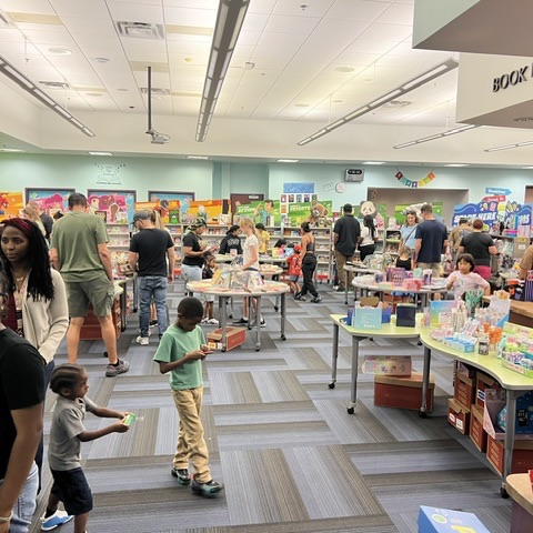 parents and students shopping at the book fair
