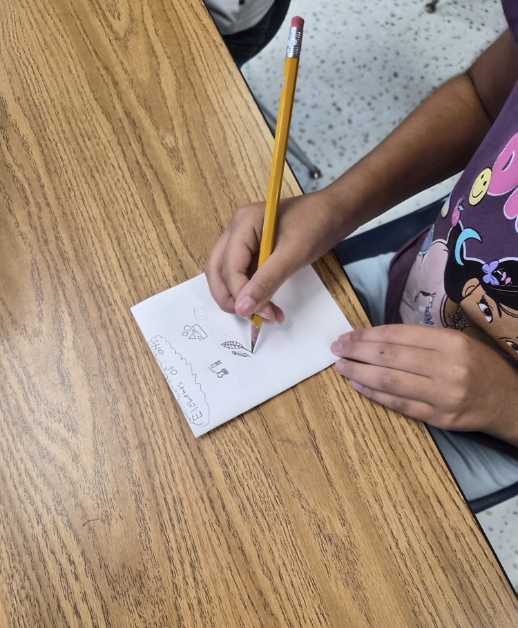 Students with their Art working on art elements