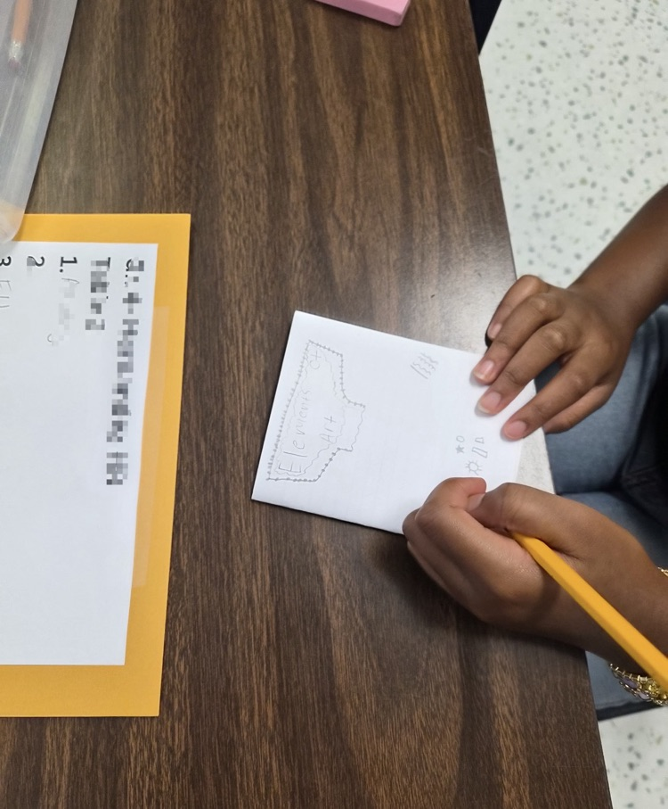 Students with their Art working on art elements