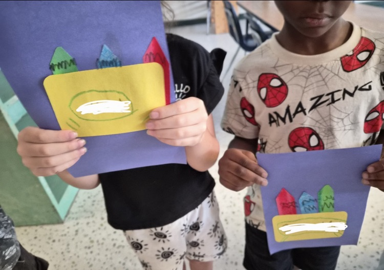 Students with their Art working on art elements