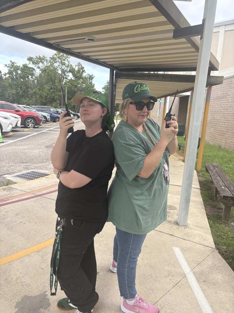 Staff Members in Gator Gear with walkies