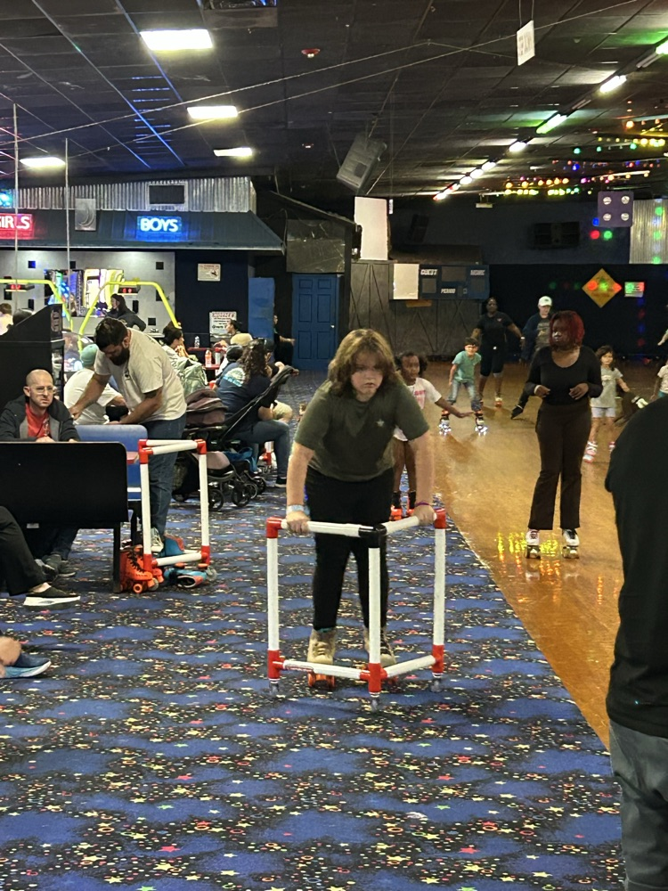 Students, Families and staff at skate station