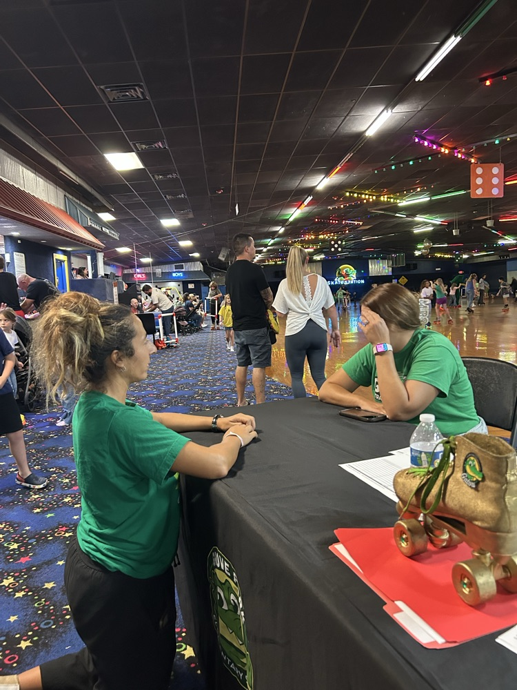 Students, Families and staff at skate station