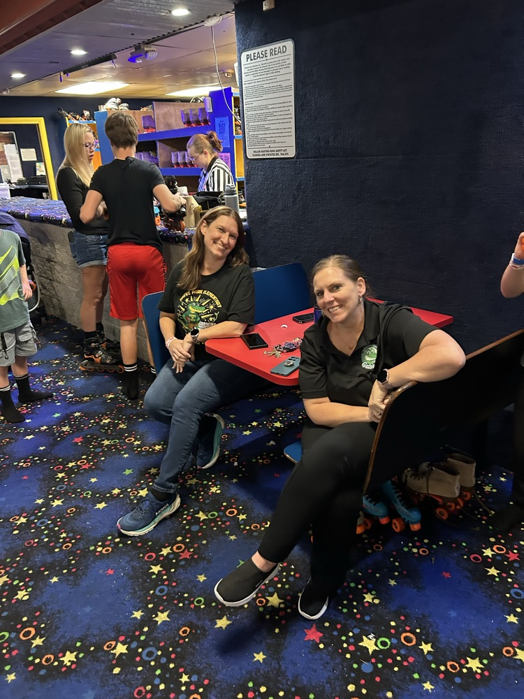 Students, Families and staff at skate station