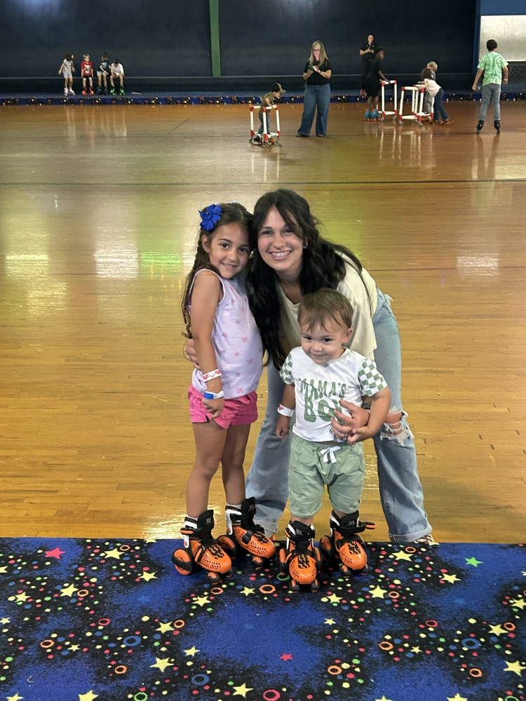 Students, Families and staff at skate station
