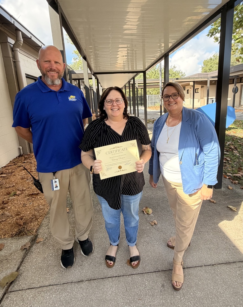Picture of Mr. Cox, Mrs. Palmer, and Ms. Deaton holding a certificate