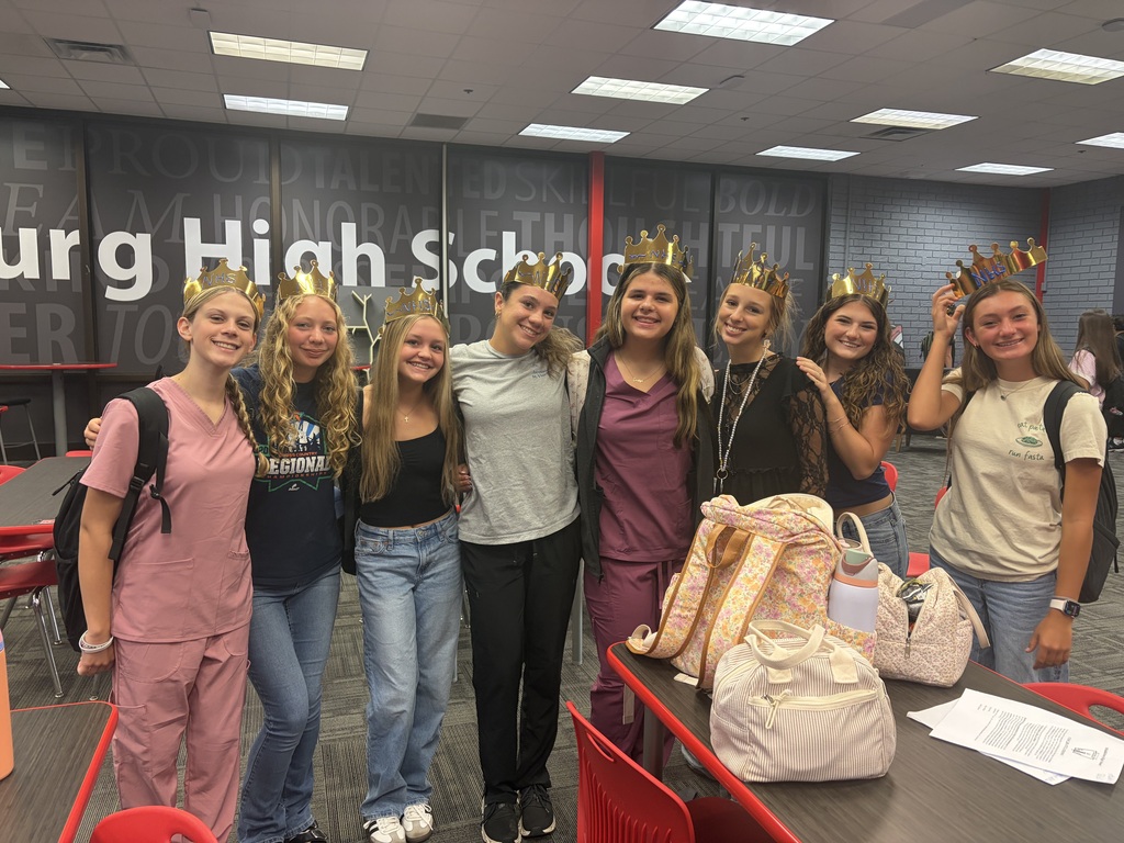 students with their crowns