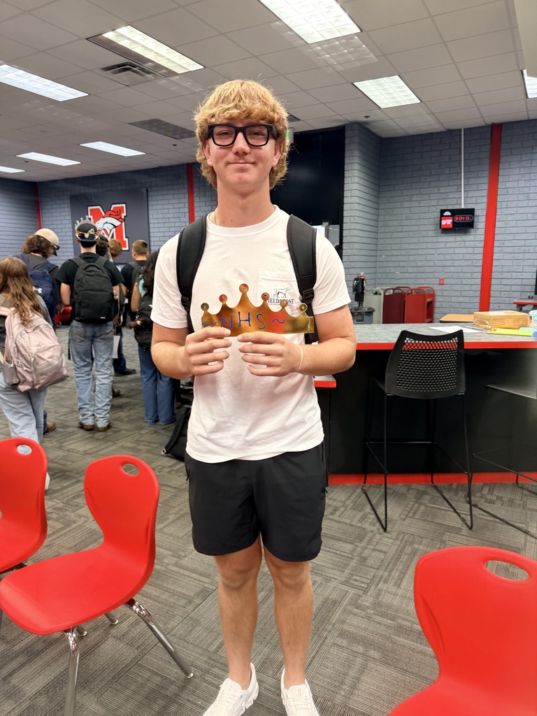 stude\nt with his nhs crown