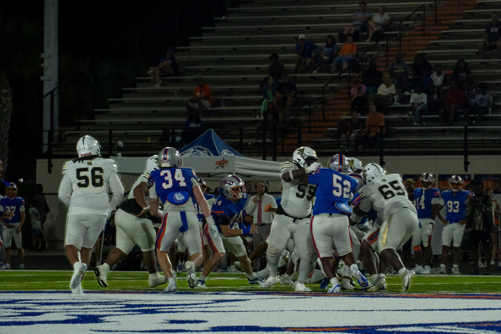OHS vs. Bolles Football Game with players, band, and cheerleaders