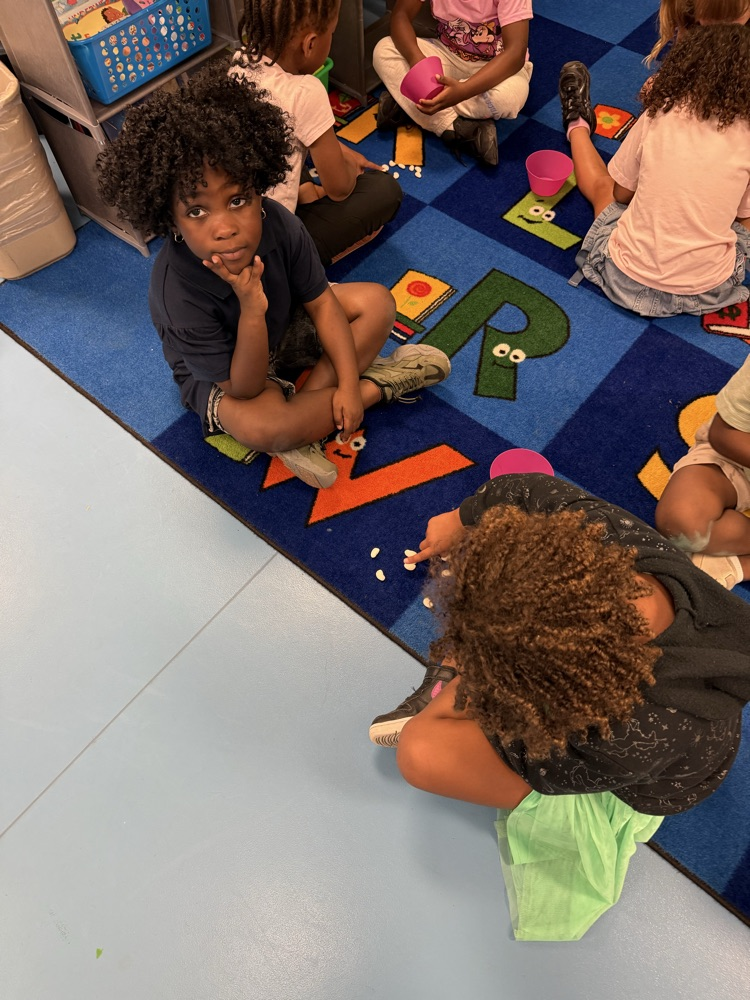 Students working together to count to 9
