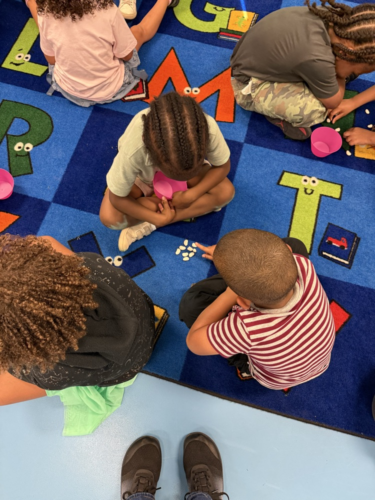 Students working together to count to 9