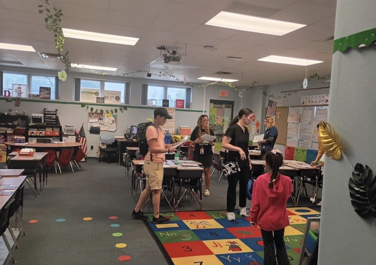 photos of students, families and staff at open house
