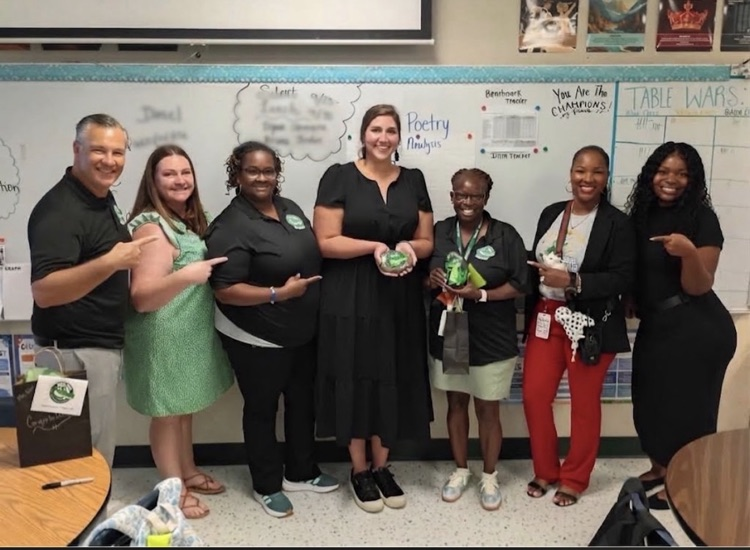 Pictures of Teachers and Students together posing and smiling for Teacher of the Year winner