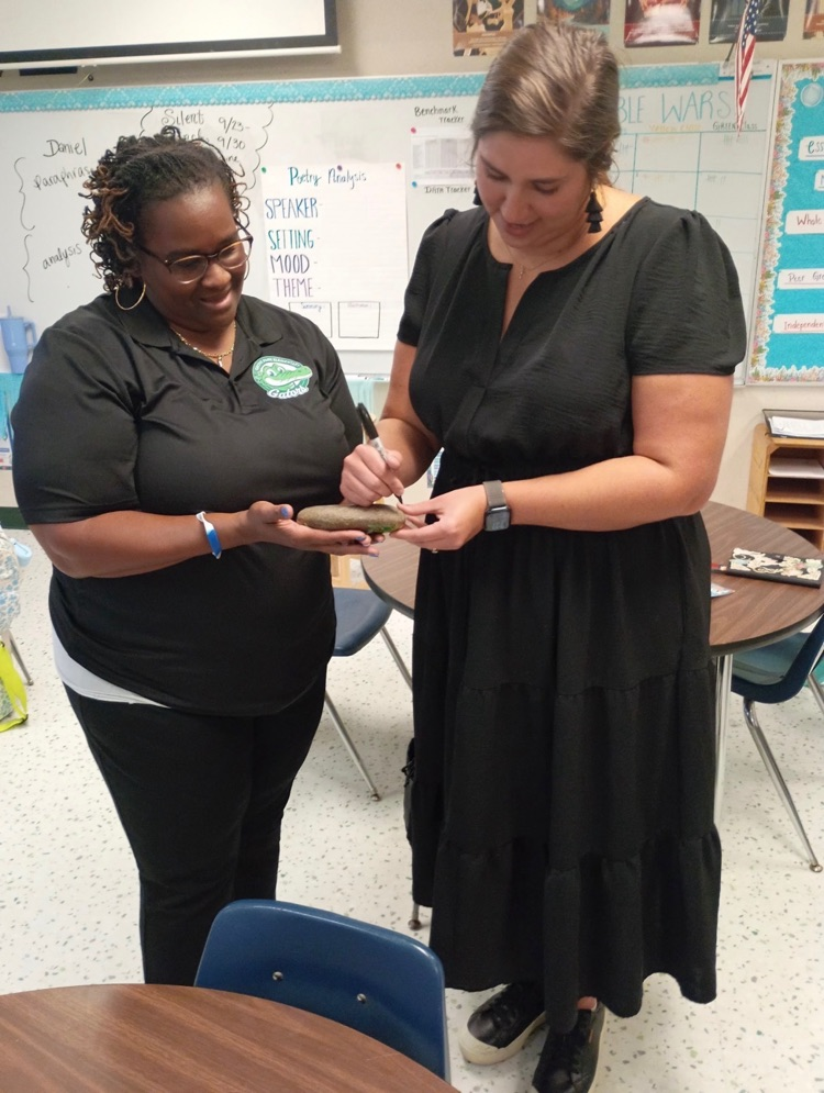 Pictures of Teachers and Students together posing and smiling for Teacher of the Year winner