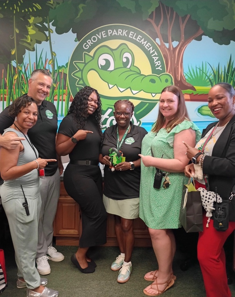 Staff members celebrating Mrs.Harris