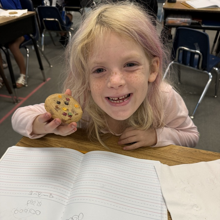 student with cookie for math visual
