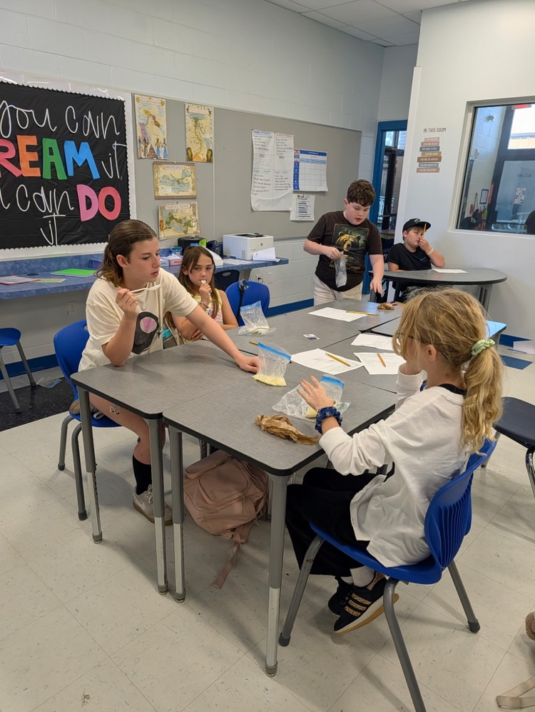 students making ice cream in science 