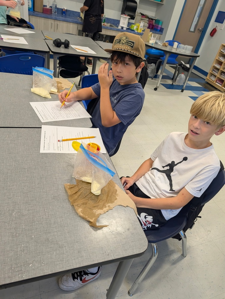 students making ice cream in science 