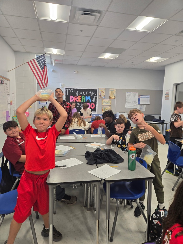 students making ice cream in science 